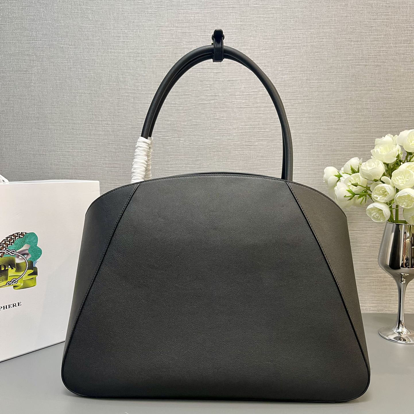 Pra*a top handle bags